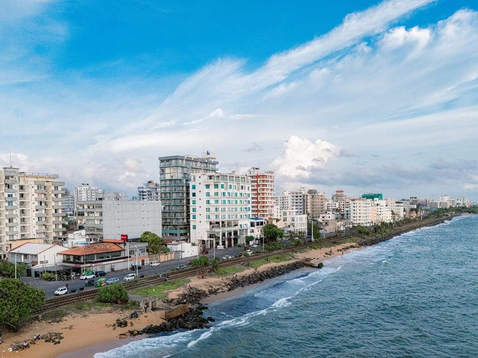 Property building, Nearby landmark, Day, Natural landscape, Bird's eye view, Beach, City view, Sea view