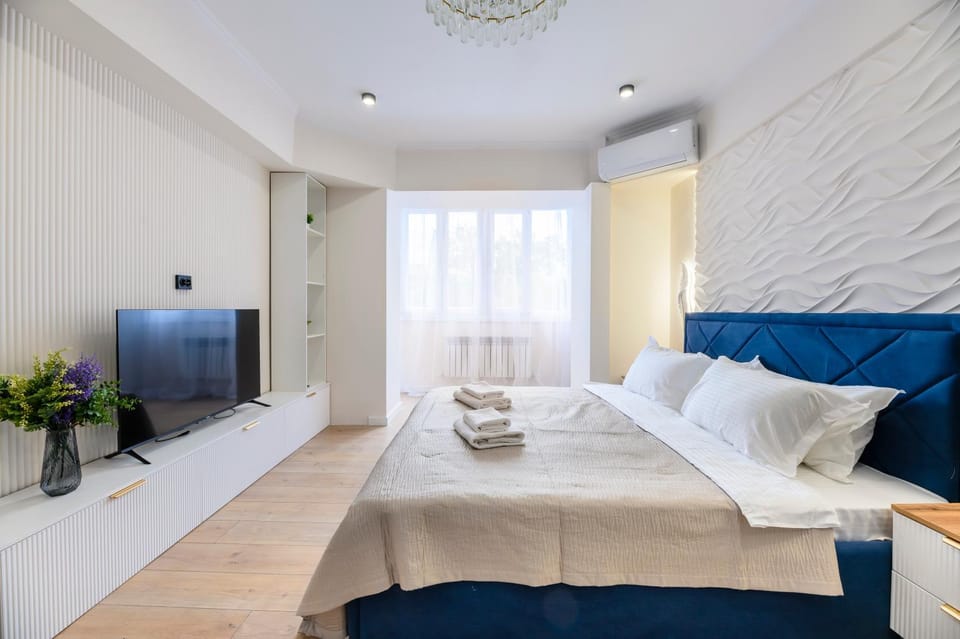 На площади Республики Apartment in Almaty