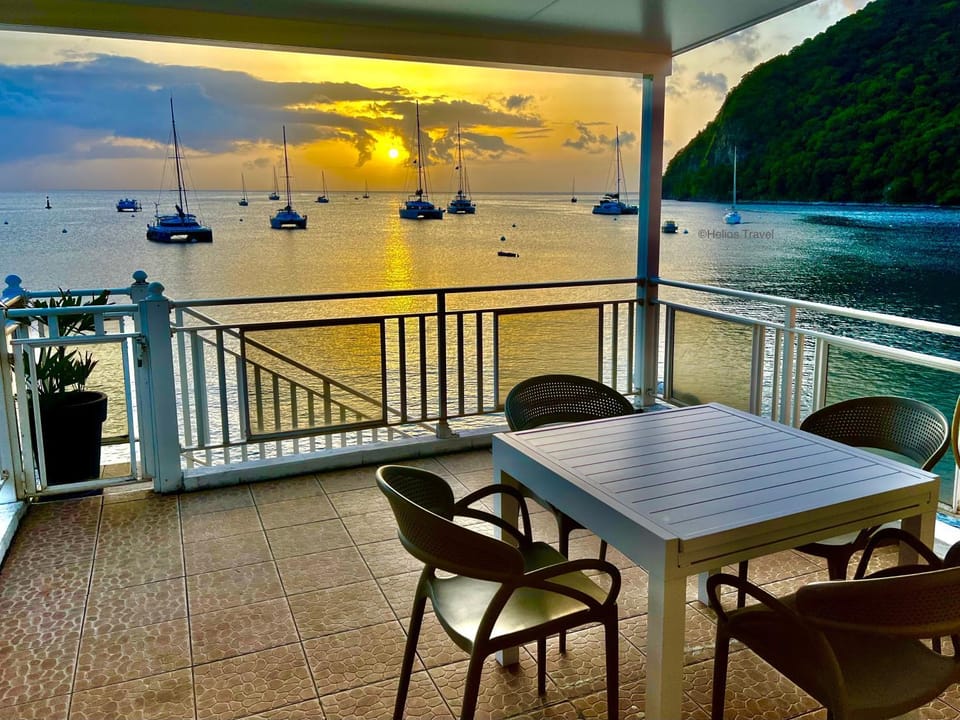 Balcony/Terrace, Dining area, Landmark view, Mountain view, Sea view, Sunset