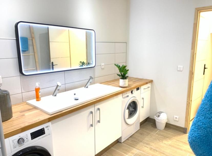 Bathroom, towels, washing machine, dryer