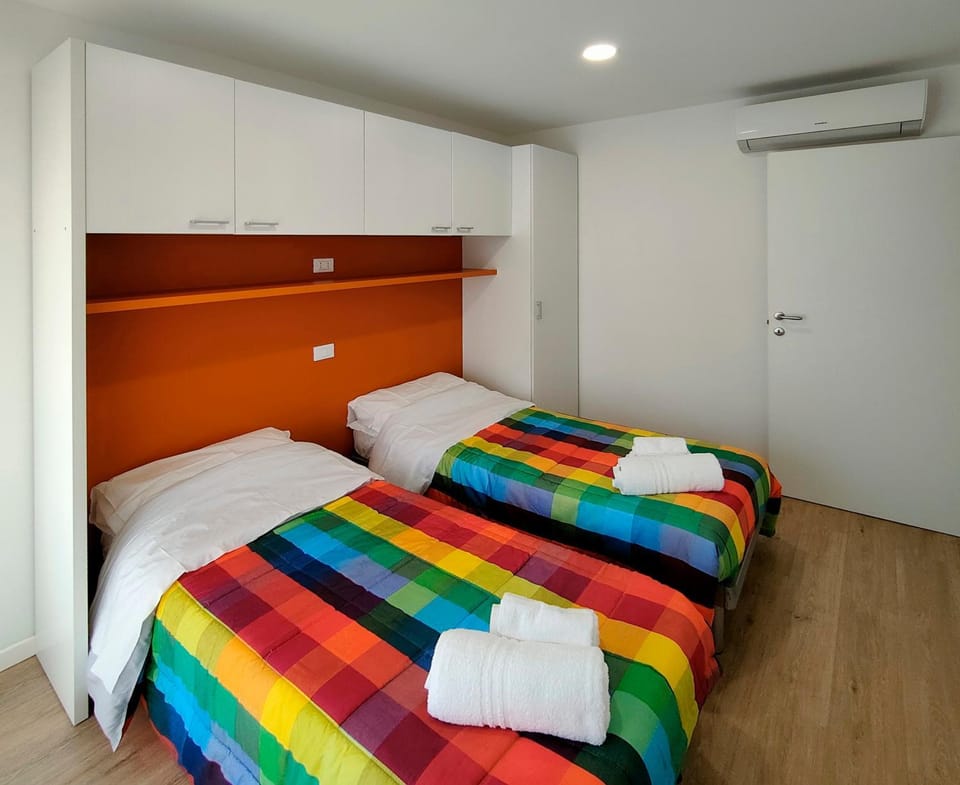 Bedroom, towels, wardrobe, air conditioner