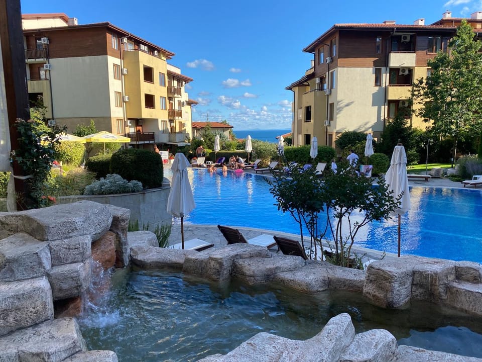 Property building, Day, Natural landscape, Pool view, Swimming pool