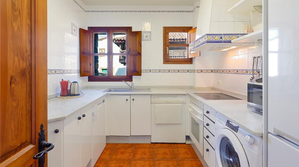 Kitchen or kitchenette, dishwasher, oven, stove, washing machine, dryer