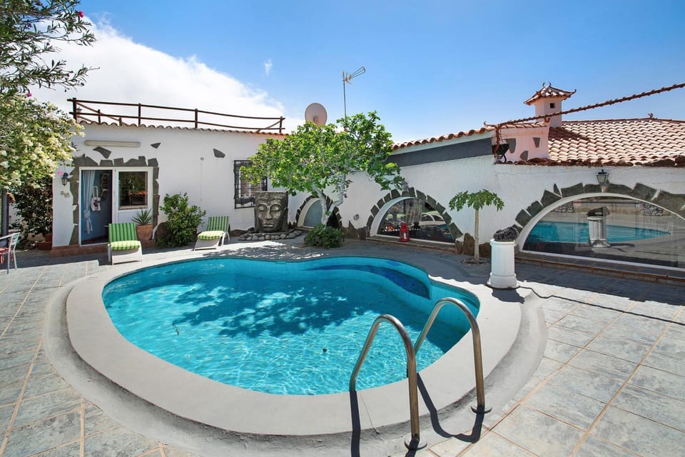 Property building, Living room, Swimming pool