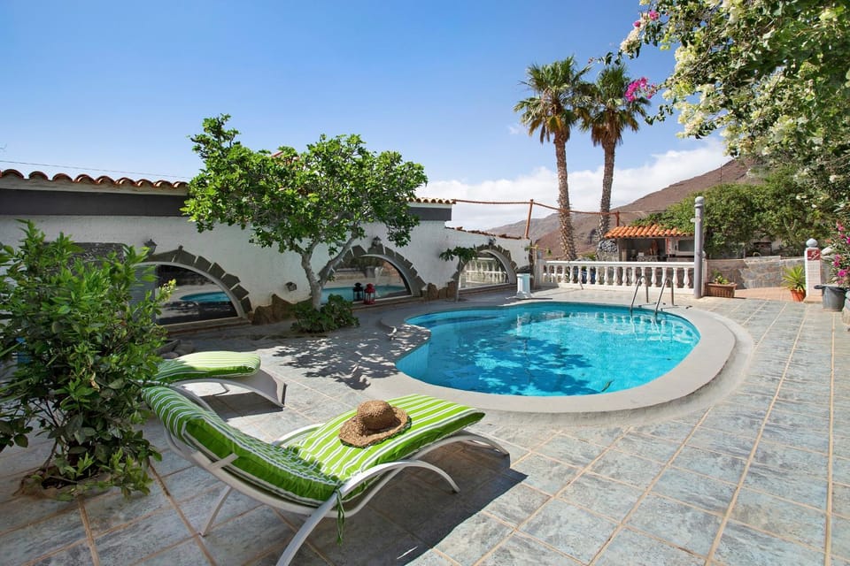 Property building, Living room, Swimming pool