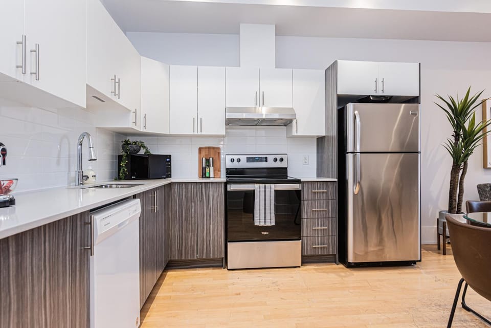 Kitchen or kitchenette, dishwasher, oven, stove