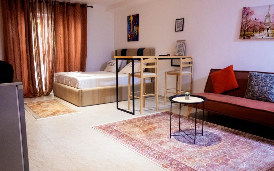 Bed, Living room, Seating area