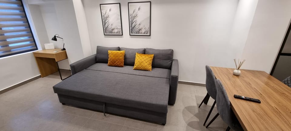 Bed, Living room, Seating area