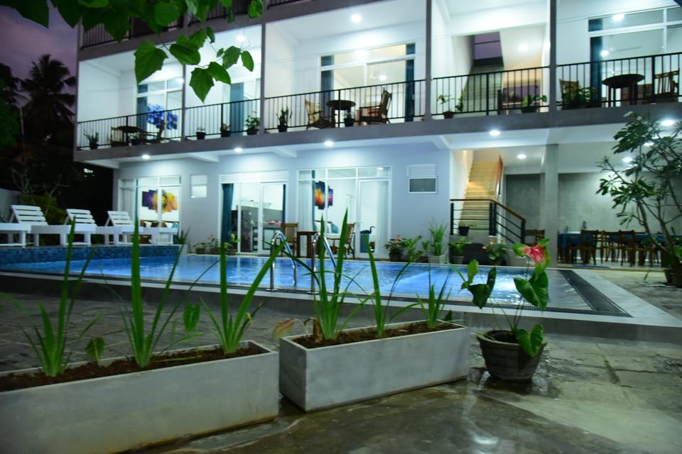 Property building, Night, Pool view, Swimming pool, Swimming pool