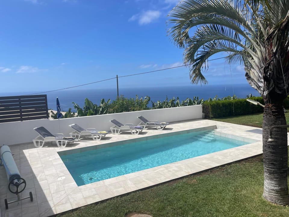 Property building, Living room, Swimming pool