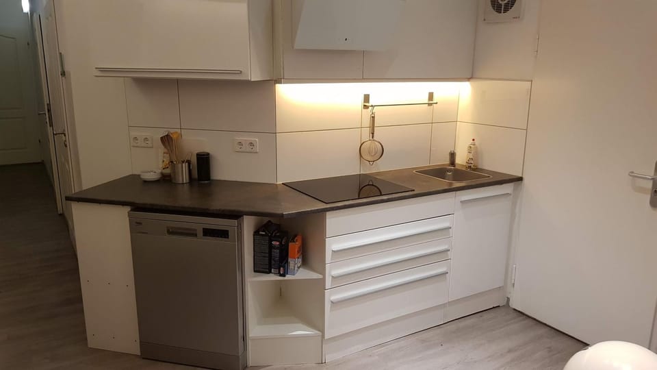 Kitchen or kitchenette, stove