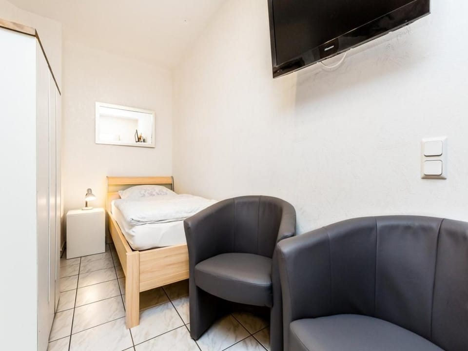 Bed, Seating area, Bedroom