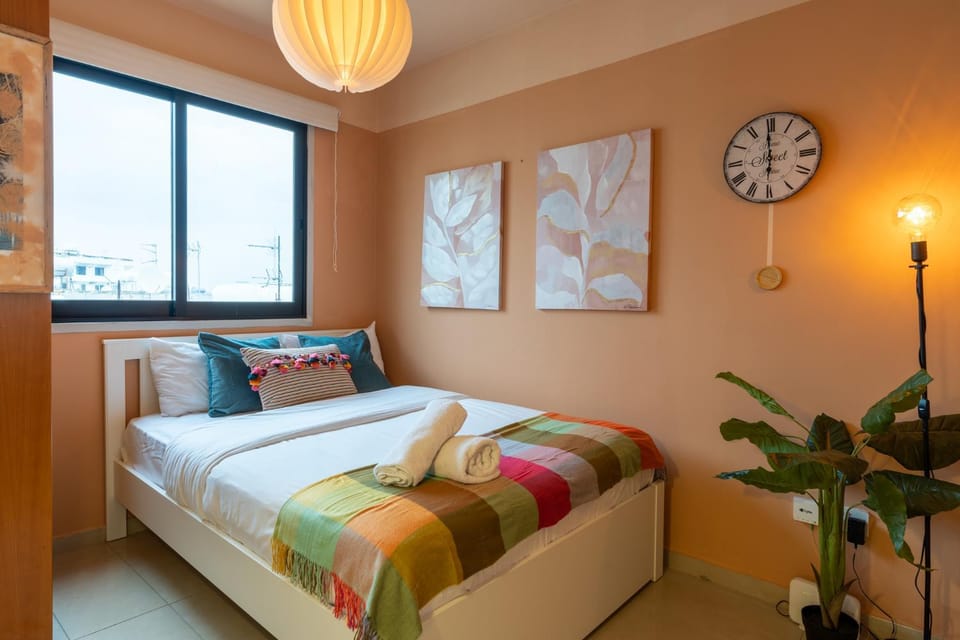 Bed, View (from property/room), towels, air conditioner