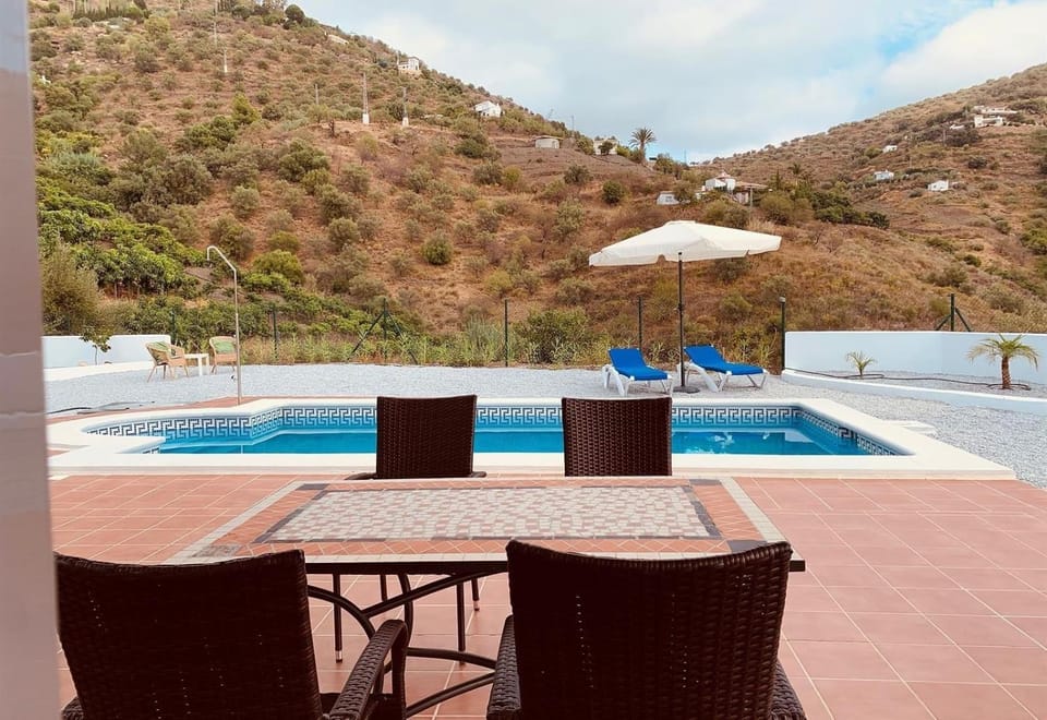 Property building, Living room, Swimming pool