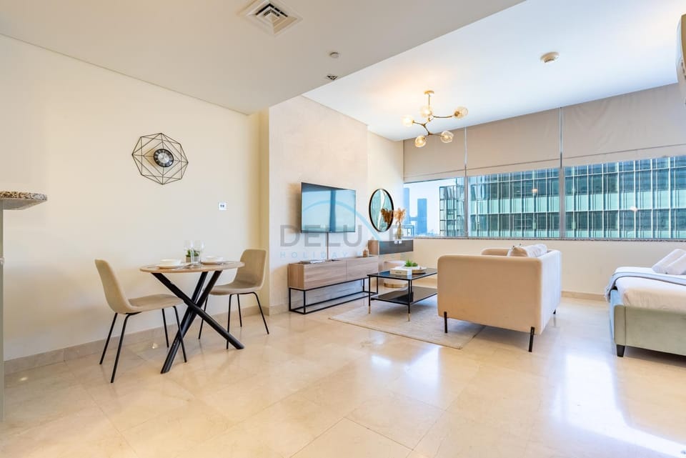 Bed, TV and multimedia, Living room, Seating area