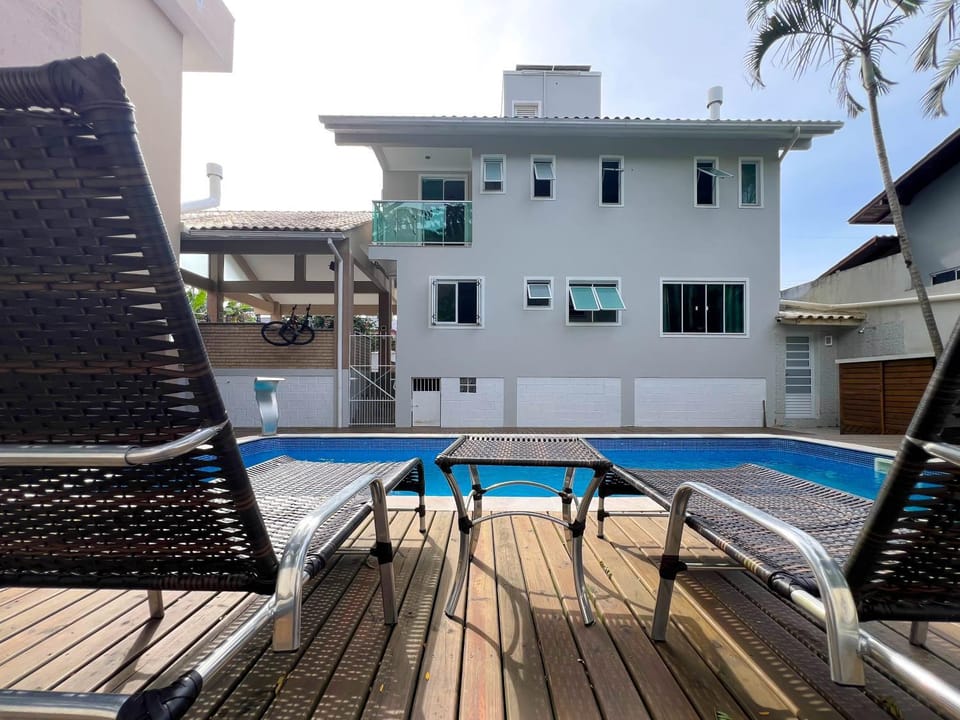 Property building, Patio, Swimming pool, sunbed