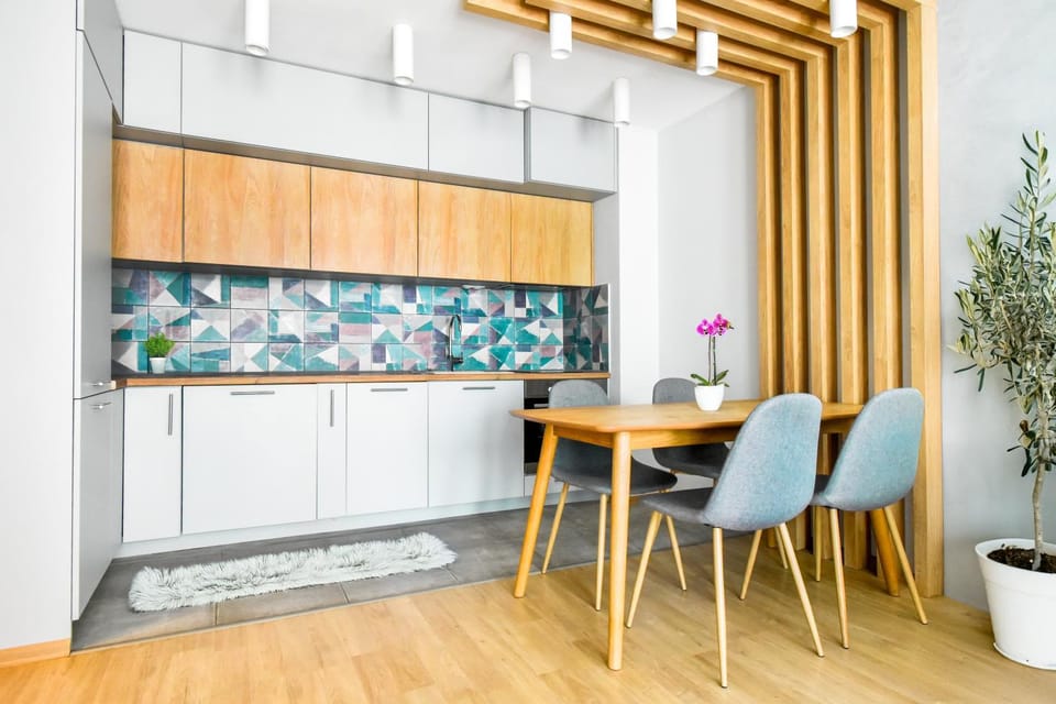Coffee/tea facilities, Kitchen or kitchenette, Decorative detail, Seating area, oven, washing machine, kitchen