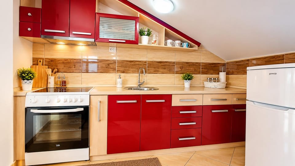 Kitchen or kitchenette, oven, toaster
