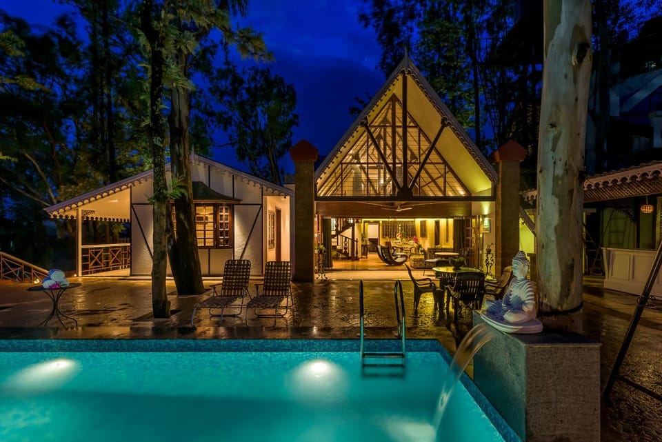 Property building, Patio, Night, Pool view, Swimming pool, sunbed