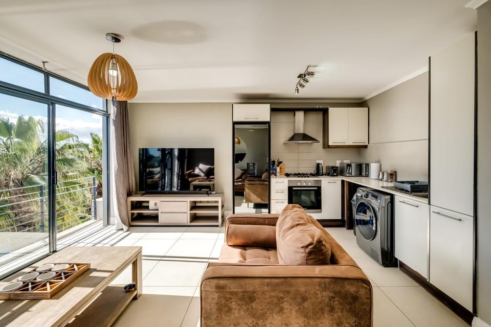 Kitchen or kitchenette, Living room, Seating area, Evening entertainment, oven, stove, toaster, washing machine, dryer