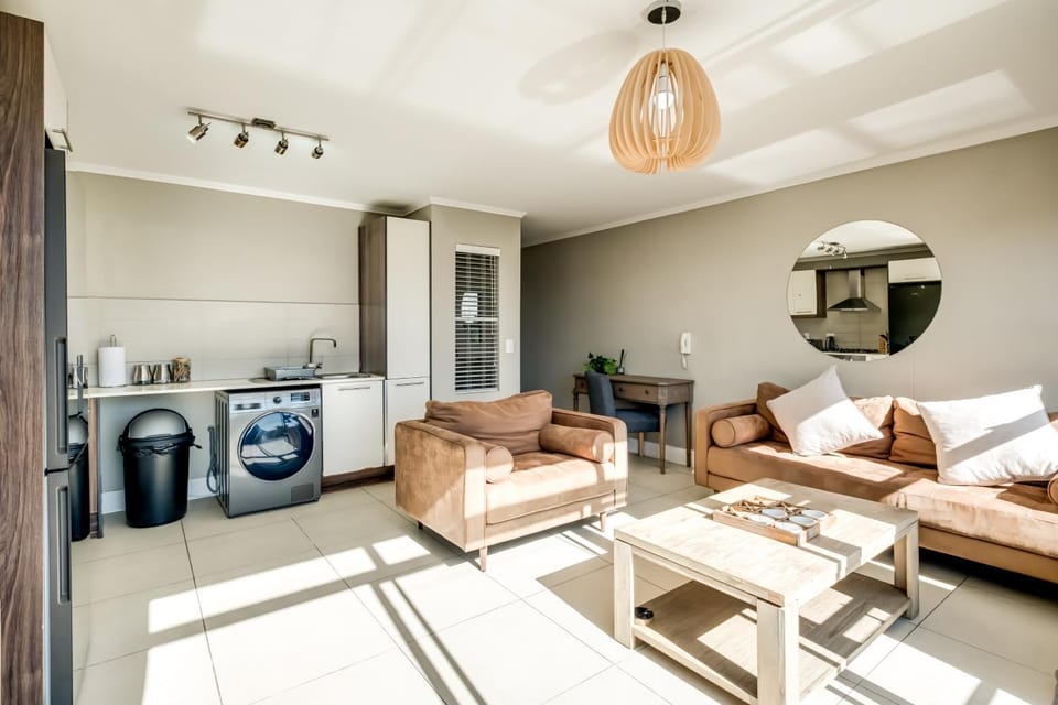 Kitchen or kitchenette, Living room, Seating area, oven, washing machine, dryer