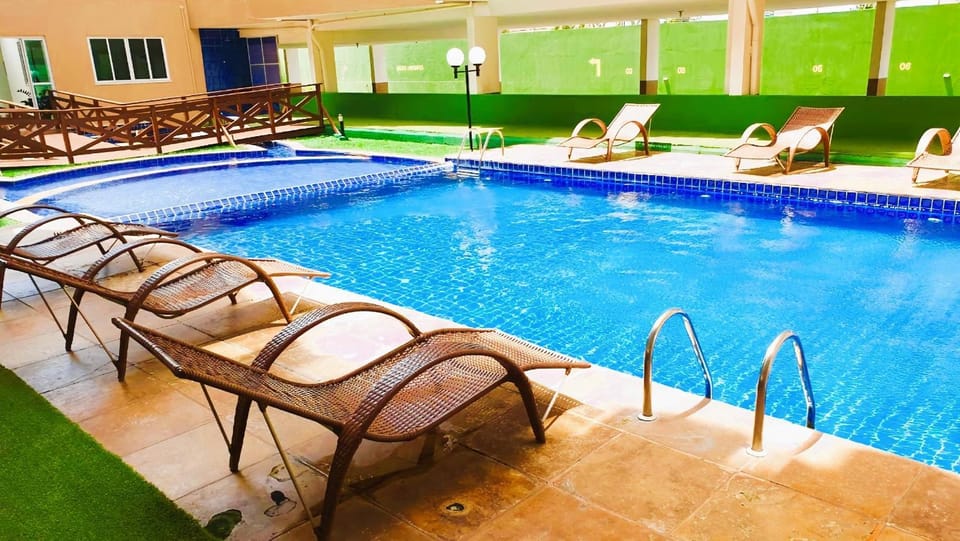 Swimming pool, sunbed