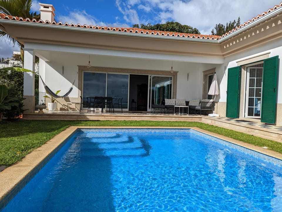Property building, Patio, Pool view, Swimming pool, Swimming pool, sunbed