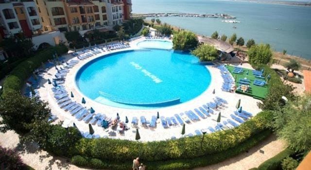 Communal lounge/ TV room, Day, Bird's eye view, Beach, Aqua park, Pool view, Swimming pool