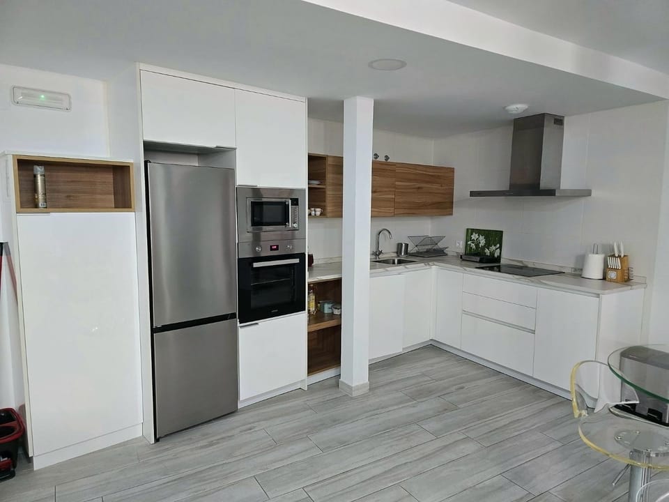 Kitchen or kitchenette, oven, stove