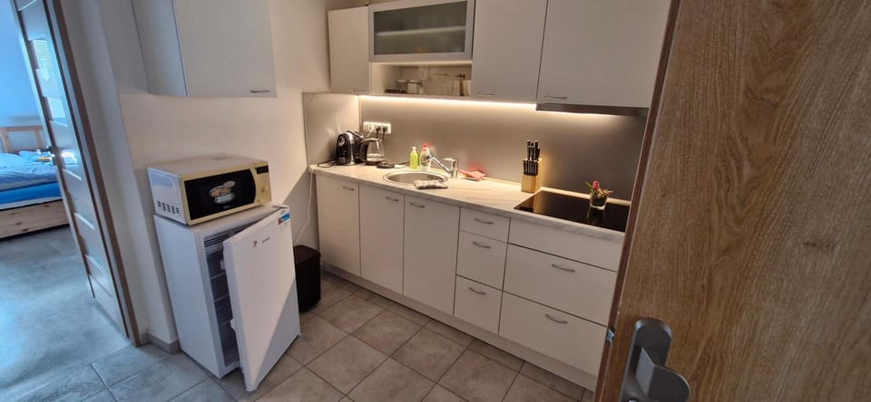 Kitchen or kitchenette, stove
