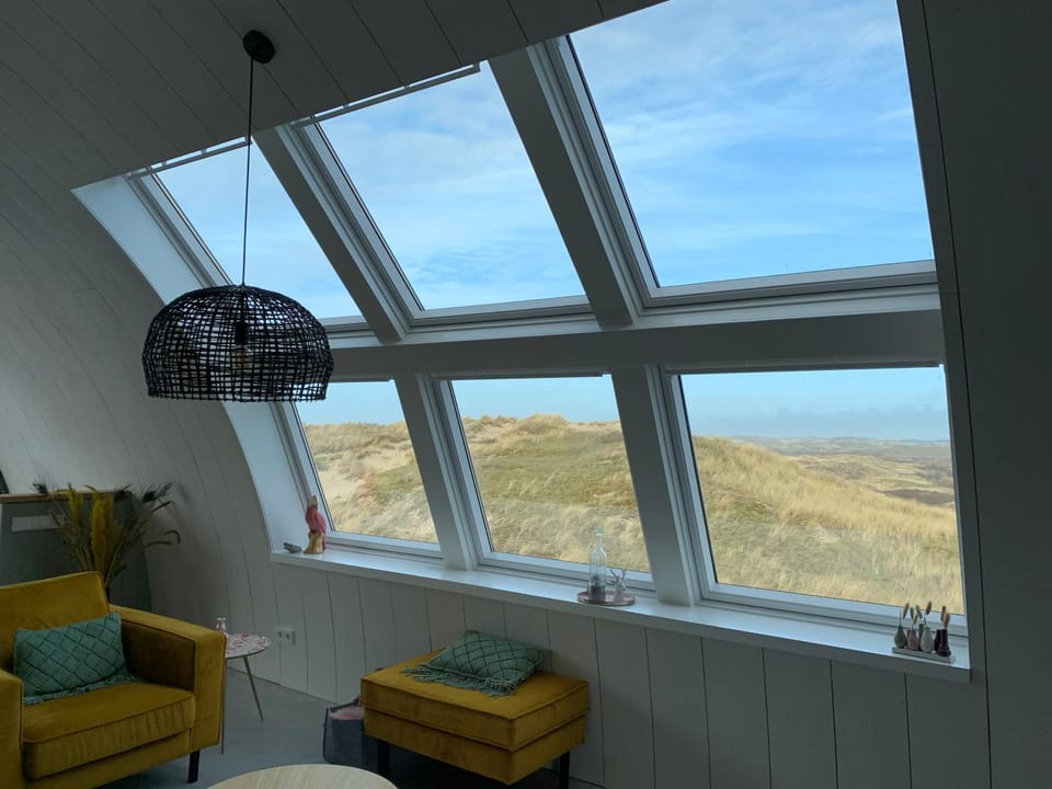 Natural landscape, Living room, Seating area, Sea view