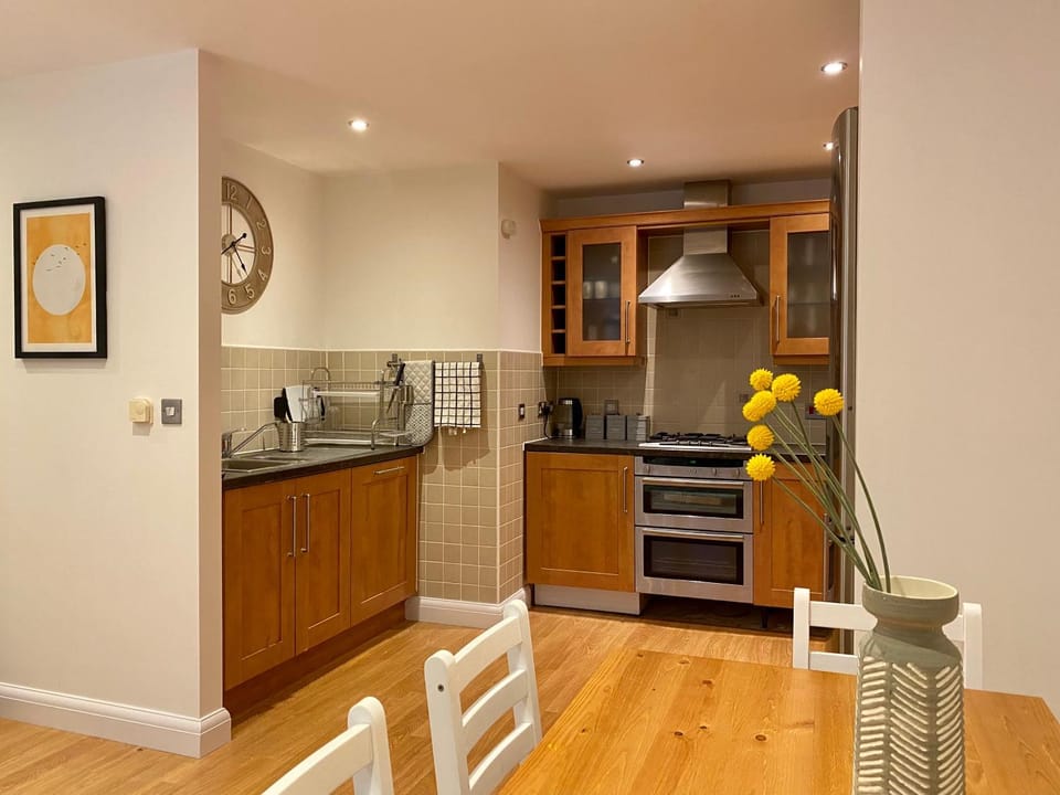 Kitchen or kitchenette, Dining area, dishwasher, oven, stove