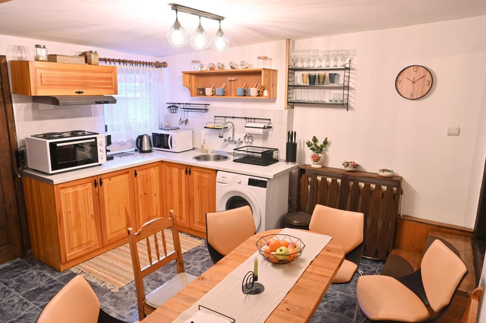 Kitchen or kitchenette, washing machine