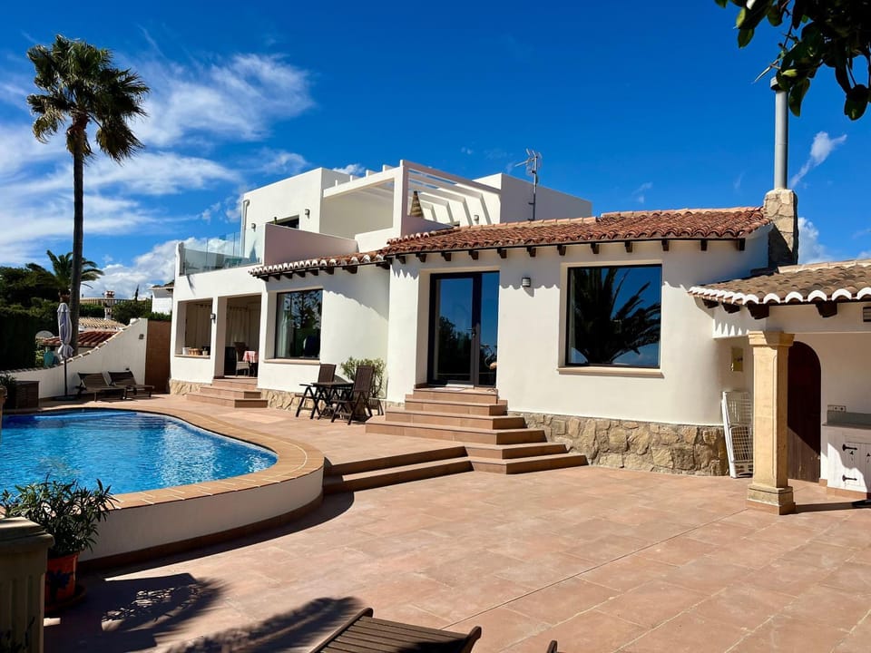 Property building, Living room, Swimming pool