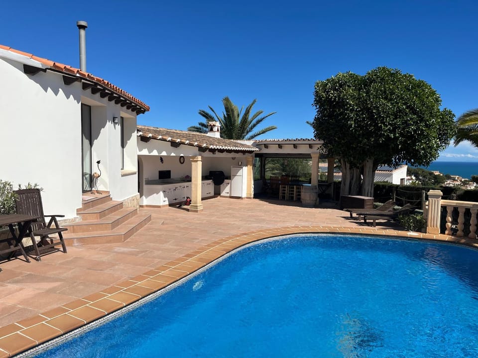 Property building, Living room, Swimming pool