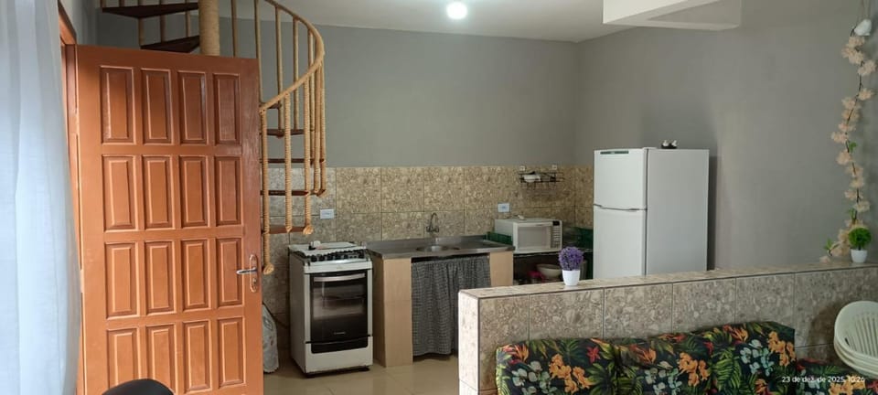 Kitchen or kitchenette, microwave, oven, stove