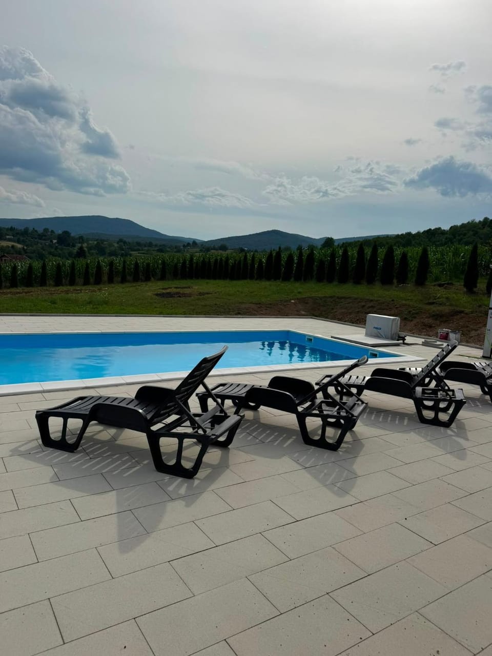 Swimming pool, sunbed