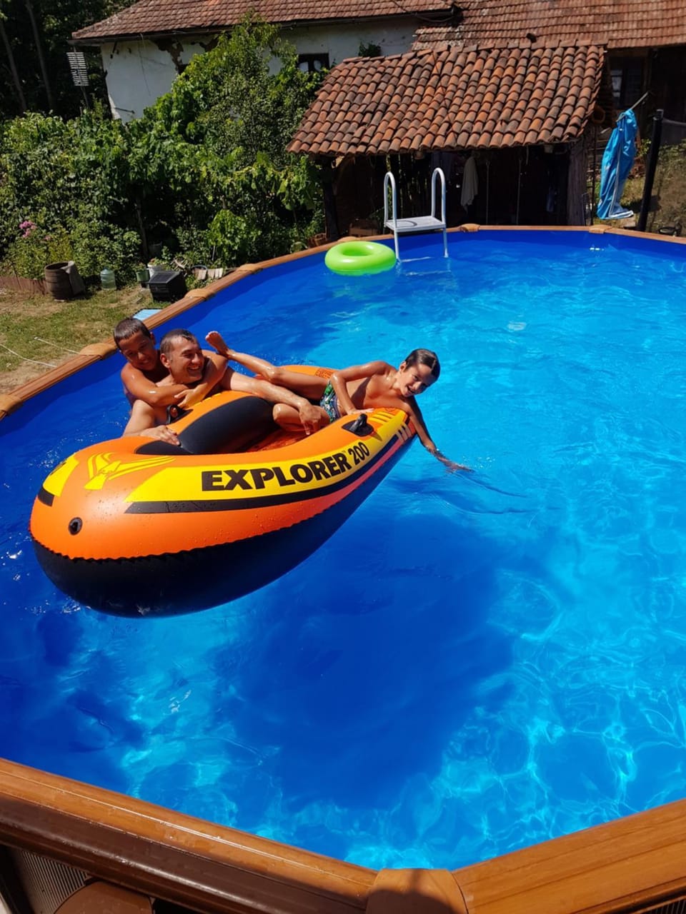 Swimming pool, children, group of guests, sunbed