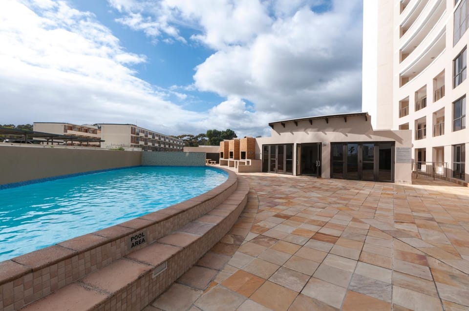 Property building, BBQ facilities, Pool view, Swimming pool