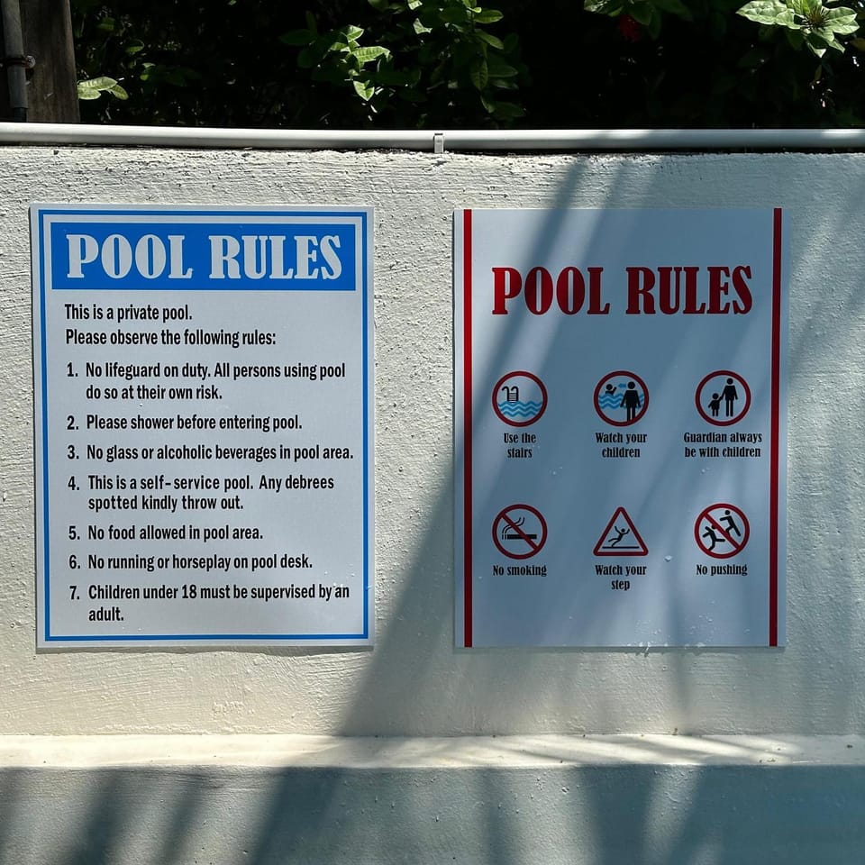 Property logo or sign, Text overlay, Swimming pool