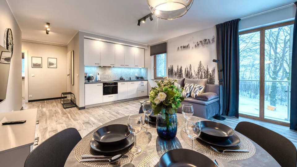 Kitchen or kitchenette, Living room, Seating area, Dining area