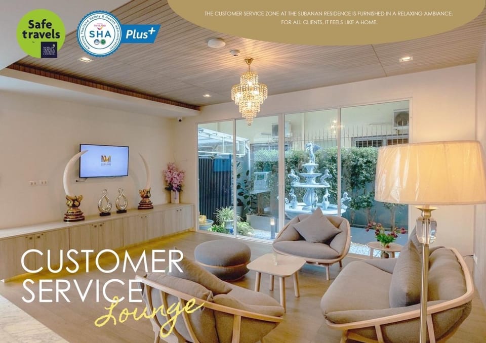 Communal lounge/ TV room, Property logo or sign, Living room, Seating area, Text overlay, Certificate/Award