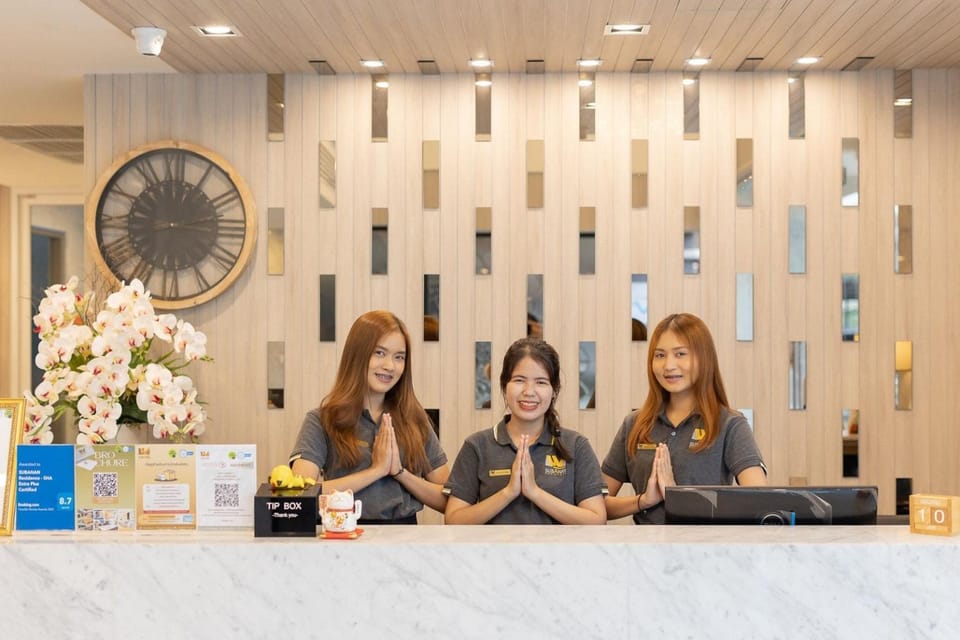 Staff, People, Property logo or sign, Lobby or reception, Logo/Certificate/Sign, Text overlay, group of guests, Certificate/Award