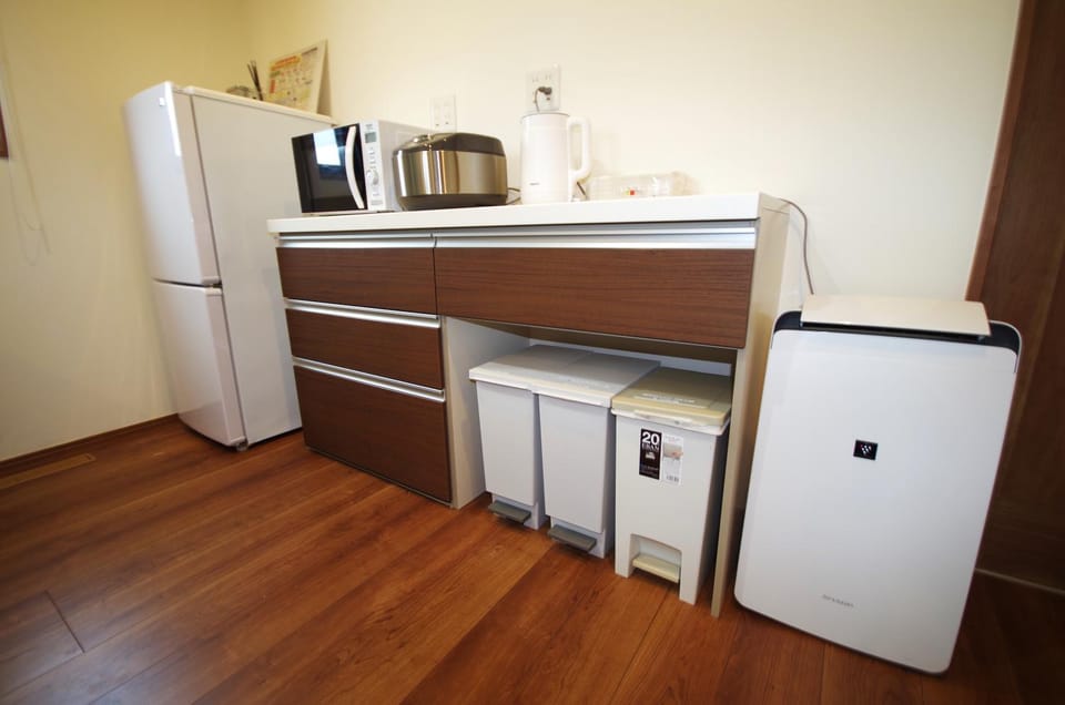 Kitchen or kitchenette, microwave