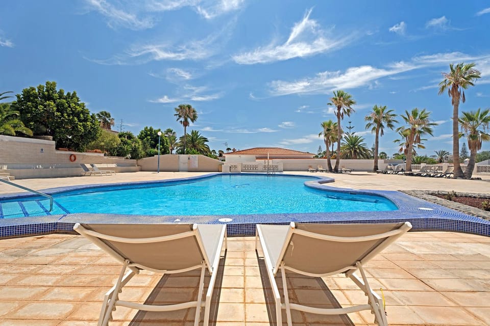 Property building, Living room, Swimming pool