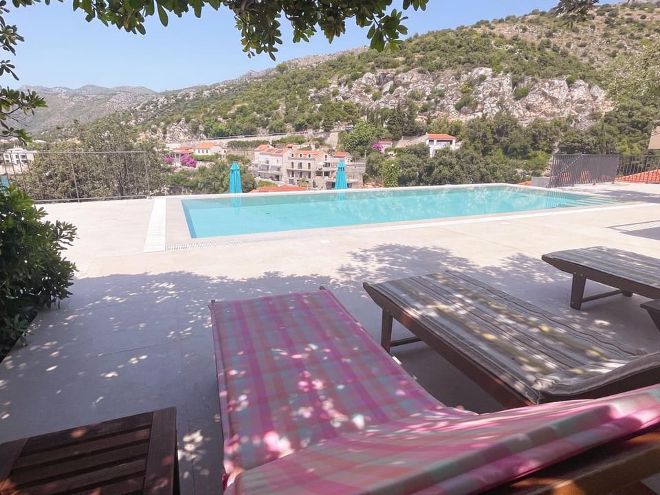 Swimming pool, sunbed