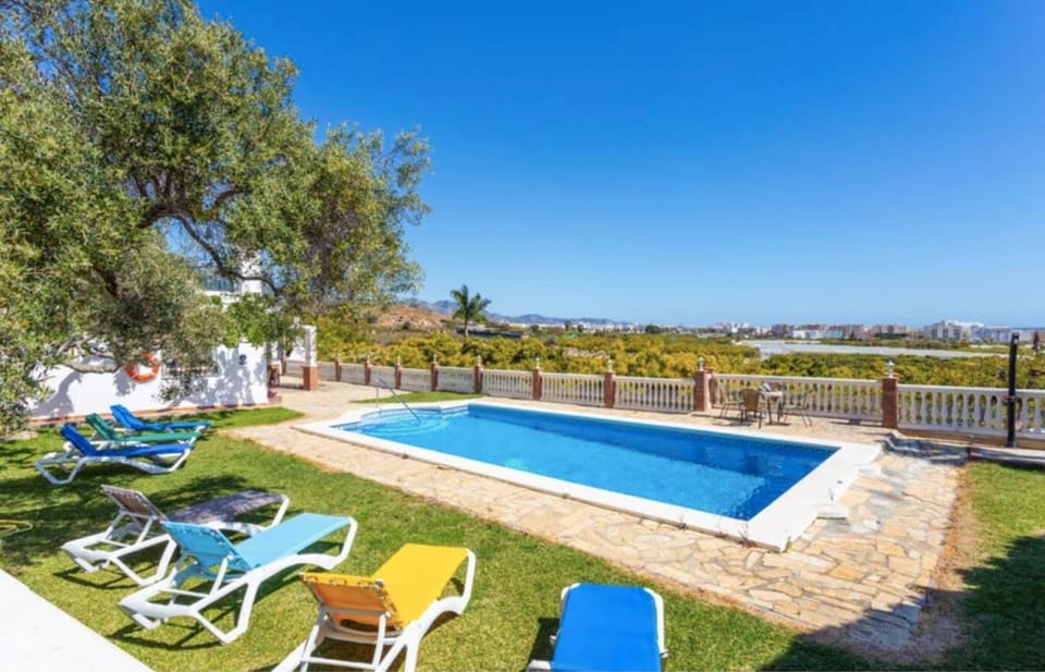 Property building, Living room, Swimming pool