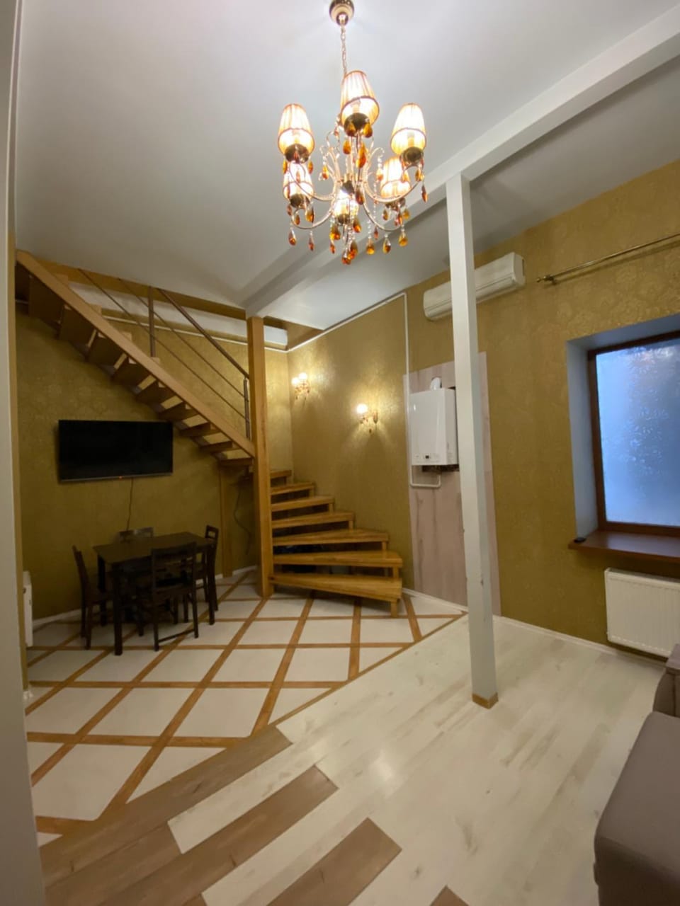 Двухуровневая квартира на Дерибасовской Apartment in Odessa