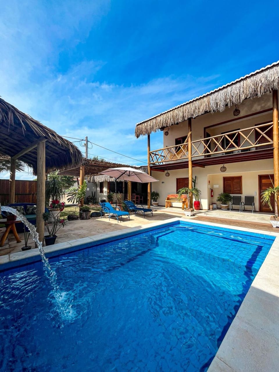 Property building, Day, Natural landscape, Pool view, Swimming pool, sunbed