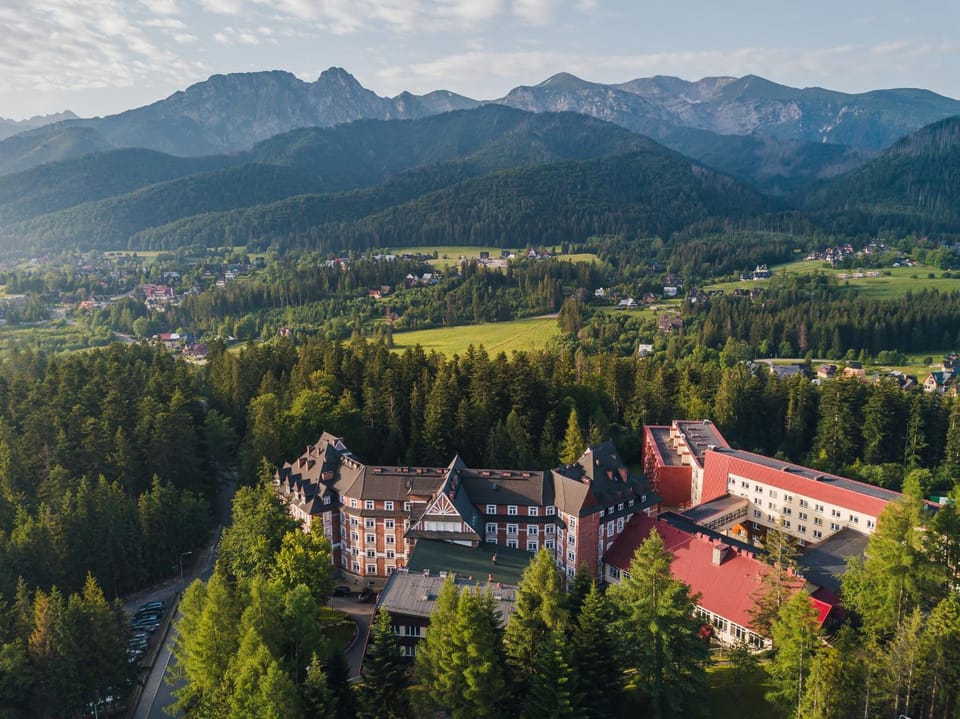 Property building, Nearby landmark, Spring, Day, Natural landscape, Bird's eye view, Mountain view